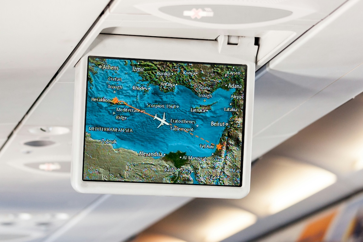 In-flight map display showing a flight route over the Mediterranean Sea